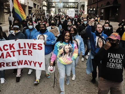 People march in Grand Rapids, Michigan, in 2021, after police in&nbsp;Louisville, Kentucky, killed Breonna Taylor, a Black woman, the year before.&nbsp;Tawanna Gordon, Taylor&#39;s cousin, leads the march.
