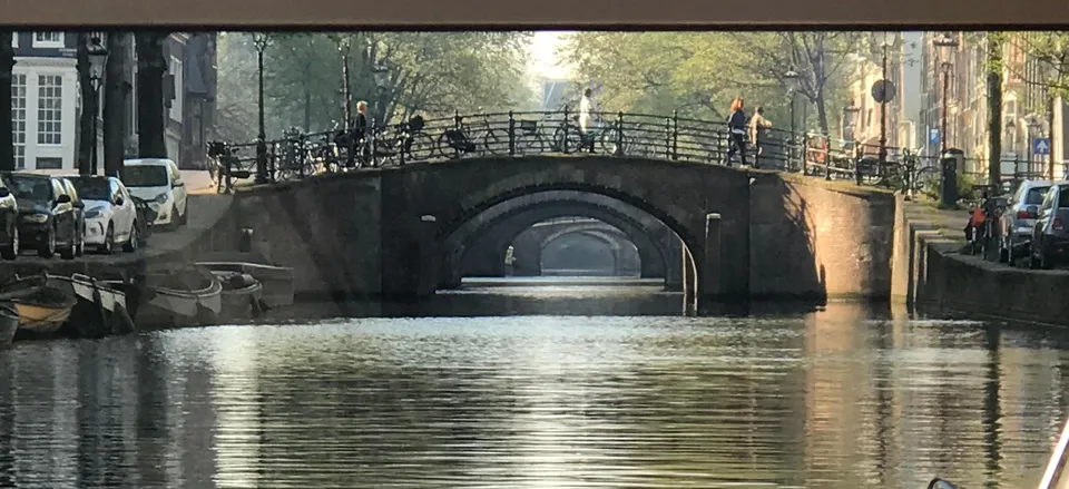 View of the bridges in Amsterdam during a canal tour 