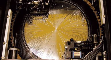 Fred and Ginger quickly and precisely configure the optical fibers beneath them.