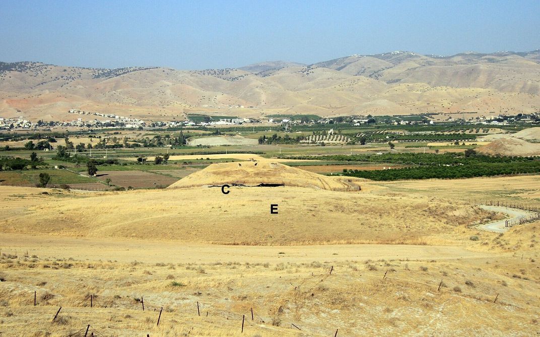 view of hilly sandy landscape where dig site is located