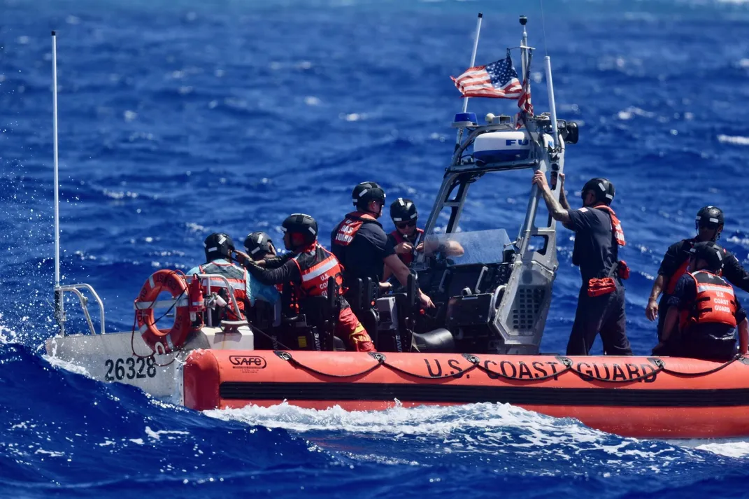 U.S. Coast Guard boat with men in it