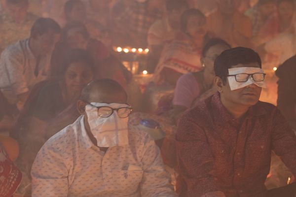 Praying at temple during Rakher Upobash thumbnail