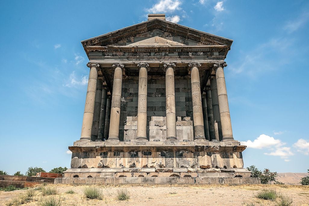 The pagan temple and the ruins of the fortress in the village of Garni
