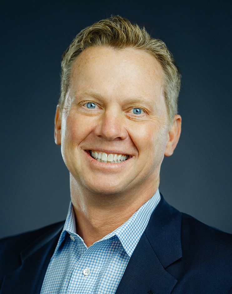 Headshot of a man smiling