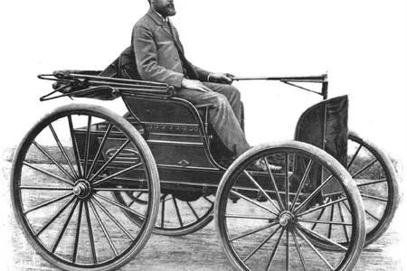 J. Frank Duryea and his American-made "motocycle" won first place in the Chicago Times-Herald race on November 28, 1895.