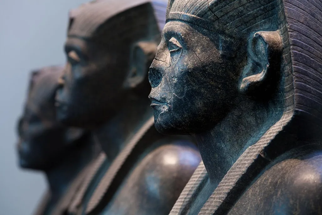 Three black granite statues of the pharaoh Senusret III, c. 1850 BC