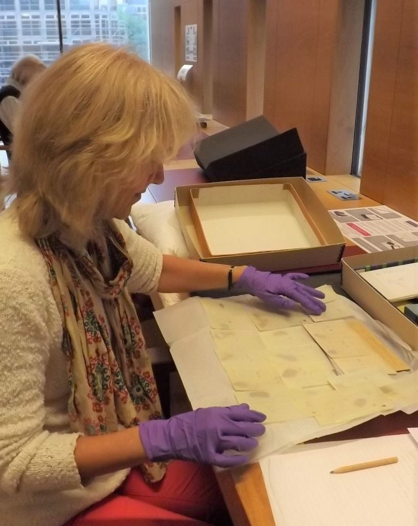 Joan Taylor examining the Dead Sea Scrolls fragments