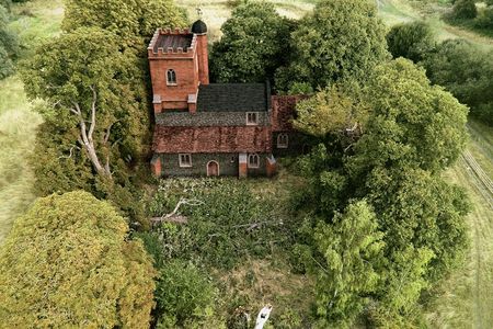 This CGI image shows what the church may have looked like when it was first built. Archaeologists found the church, which dates back to 1080, along with a small number of burials during construction of the HS2 railway system. 