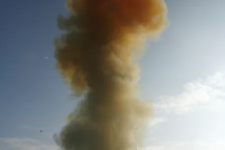 A Pentagon missile knocks a falling satellite out of the sky.