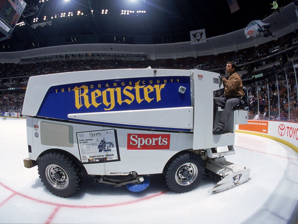 Zamboni machine resurfacing ice