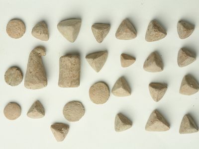 Clay tokens that Assyrians used for a simple bookkeeping system.   