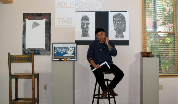 Ian Kuali'i with some of his cut-paper art, June 2019. (Courtesy of the artist)