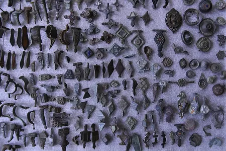 Authorities grew suspicious of the man after he claimed to have found 14,000 Roman coins in a Belgian orchard.