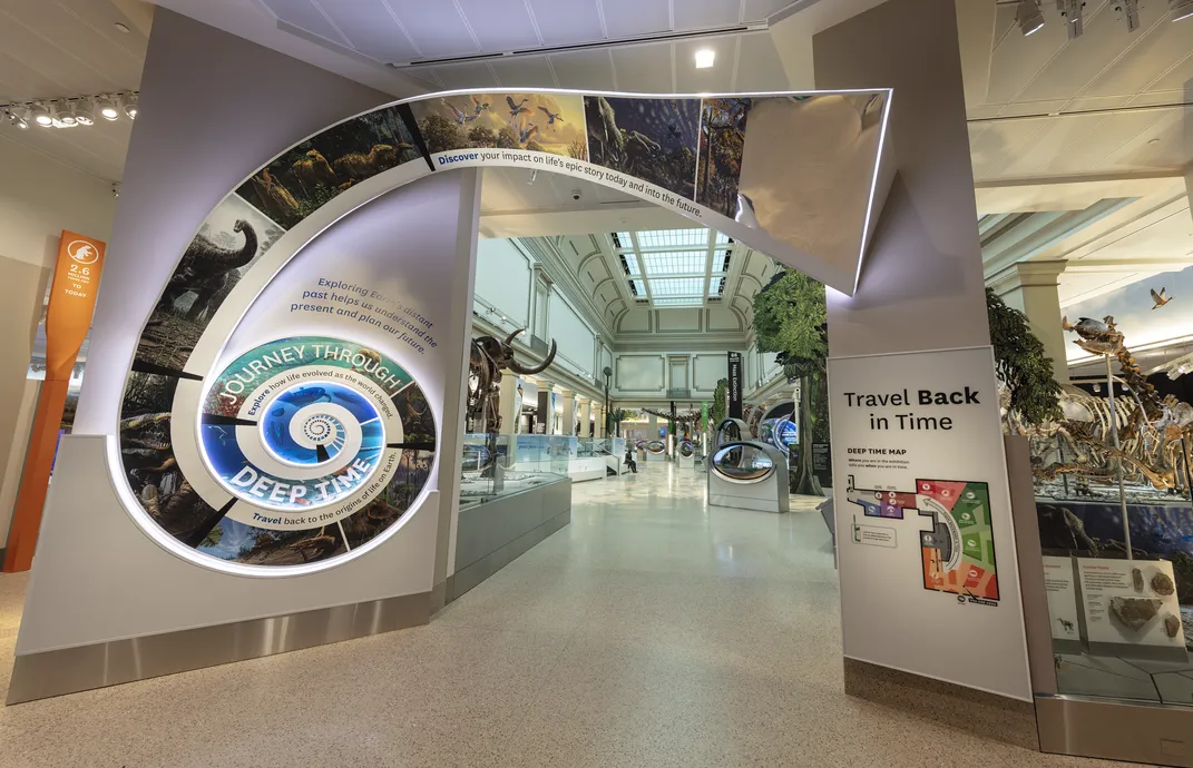 Color coded signs introducing the fossil hall at the entrance to the exhibition from the rotunda.  