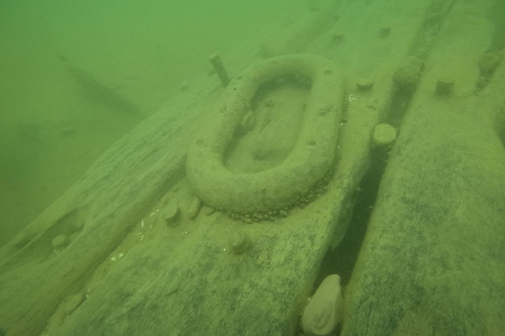Murky view of shipwreck underwater