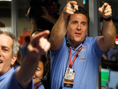 Adam Steltzner celebrates the successful landing of the Curiosity rover on Mars on August 5, 2012.
