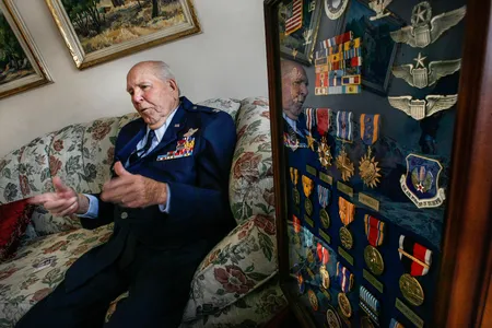 A display of some of the medals awarded to Emmett Davis (in his home, in 2012) sums up a long, exemplary career.