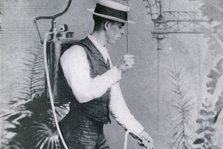 David Fairchild demonstrates a new crop spraying technique in 1889.