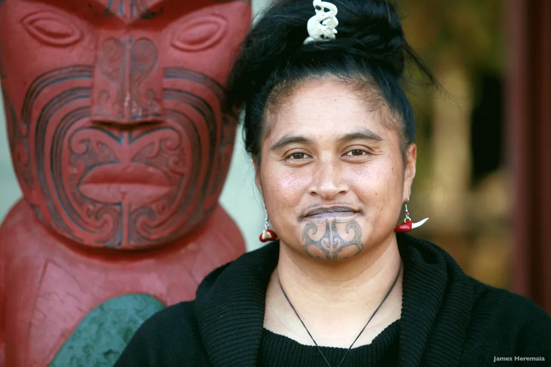 Maori woman with traditional tattoos. Credit: James Heremaia/Tourism New Zealand