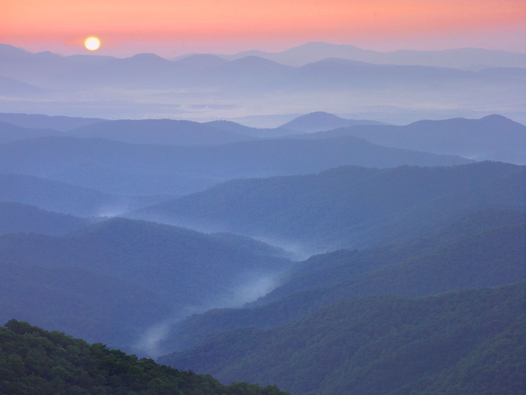 Sunset over the Pisgah National Forest from the Blue Ridge Parkway, NC. (Tim Fitzharris/Minden Pictures/Corbis)