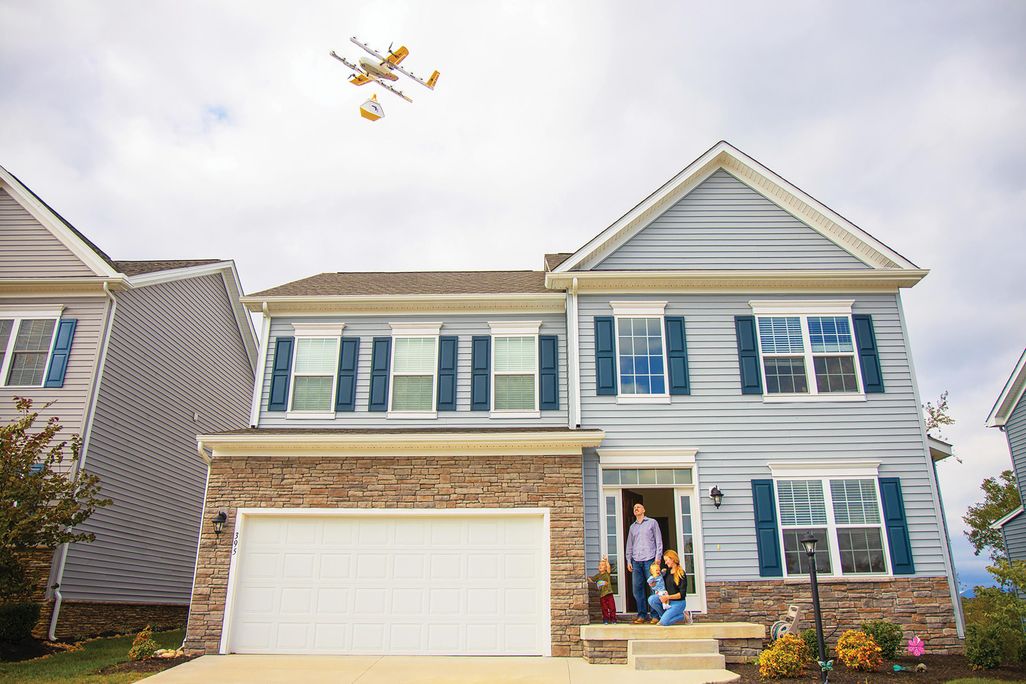 drone hovering over a house
