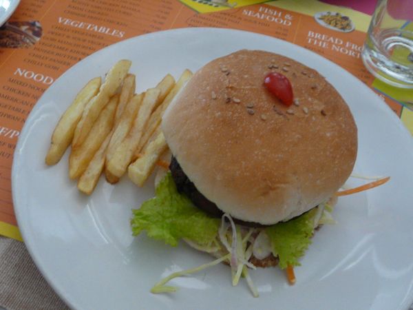 American burger topped with a cherry in Kottayam, Kerala, India thumbnail