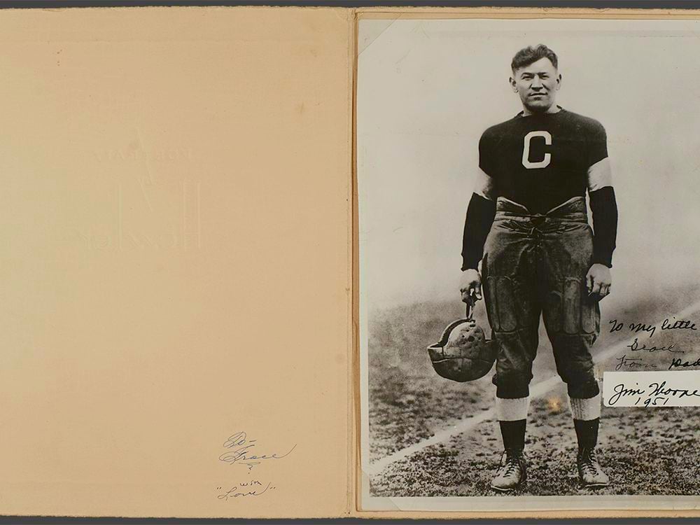 Jim Thorpe (Sac and Fox), with the inscription “To my little girl Grace From Dad Jim Thorpe 1951.” The photo, in the original folder frame, shows Thorpe during his career with the Canton Bulldogs football team, ca. 1915 to 1920. Grace Thorpe Collection, NMAI.AC.085 (pht_092_002). (National Museum of the American Indian Archives Center, Smithsonian)