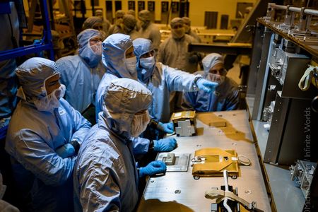 Four of the astronauts who will be conducting spacewalks train at the Kennedy Space Center.