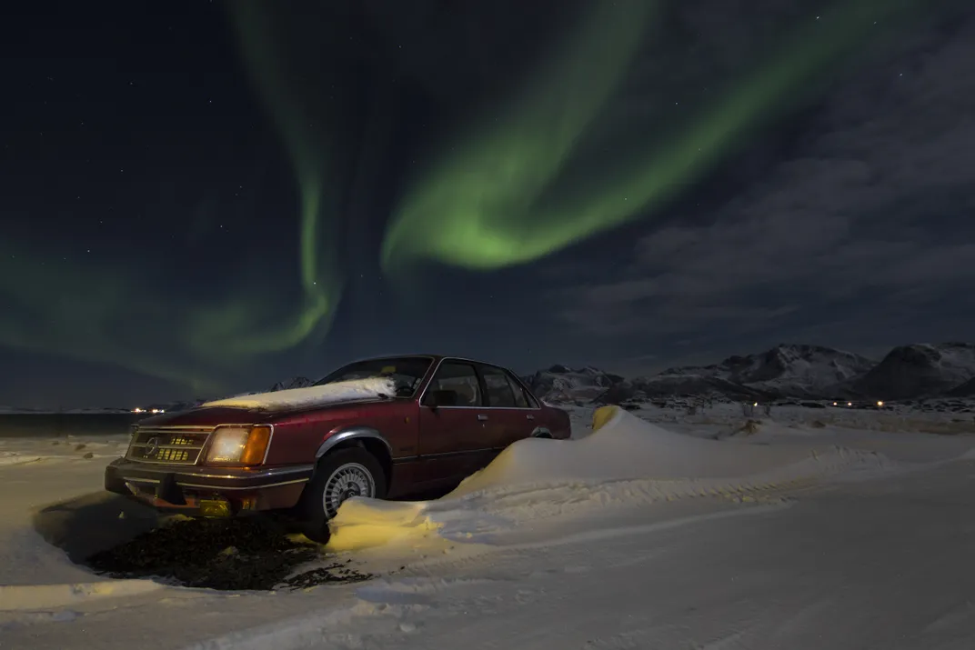 a car on snow during the night