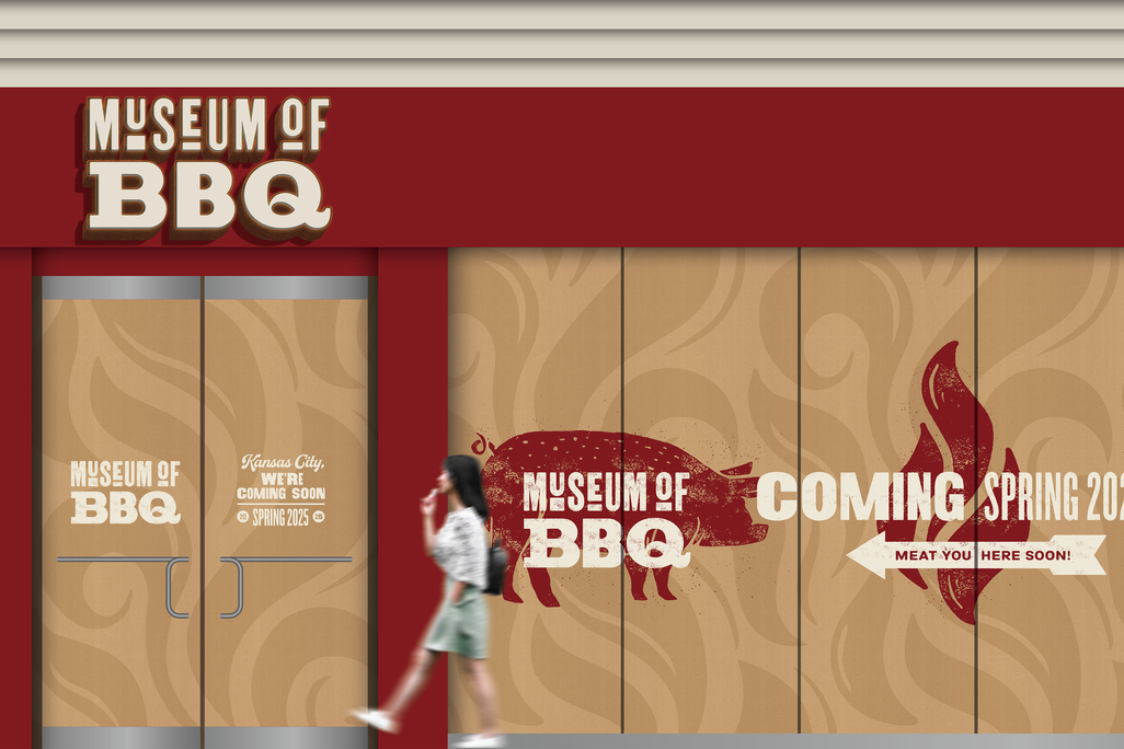 Woman walking in front of building with signs that say Museum of BBQ