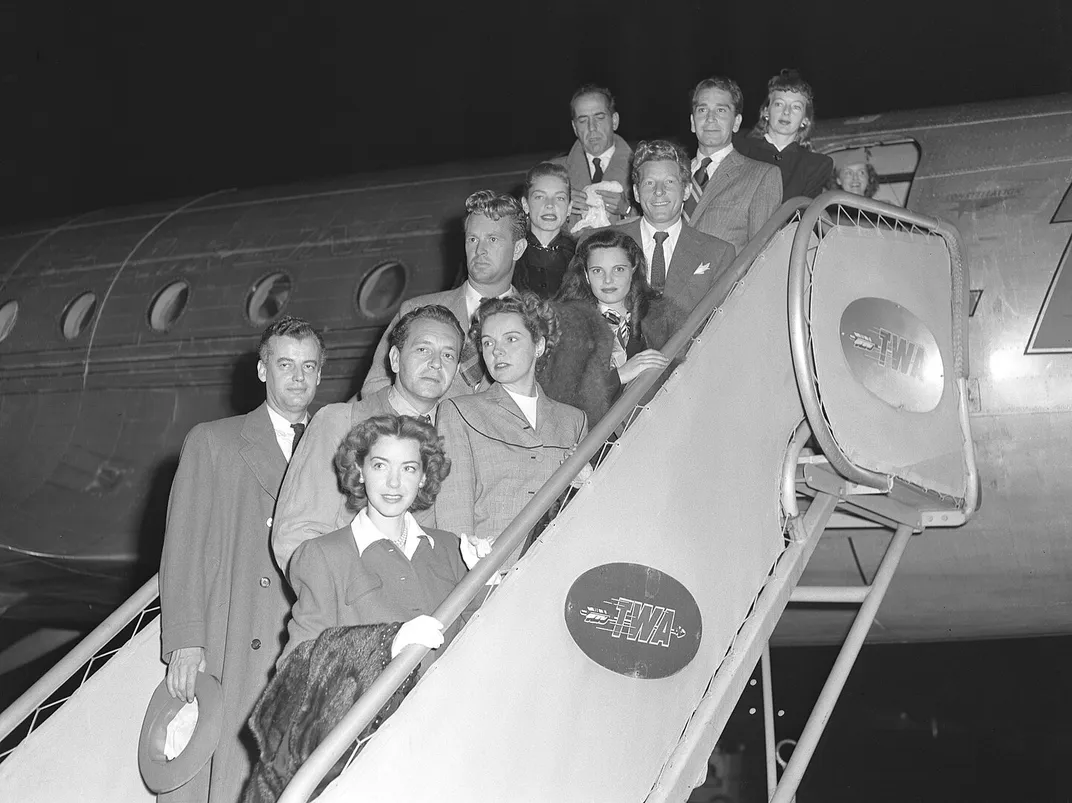 Members of the Committee for the First Amendment, a group formed in support of the Hollywood Ten, disembark in Los Angeles in 1947.