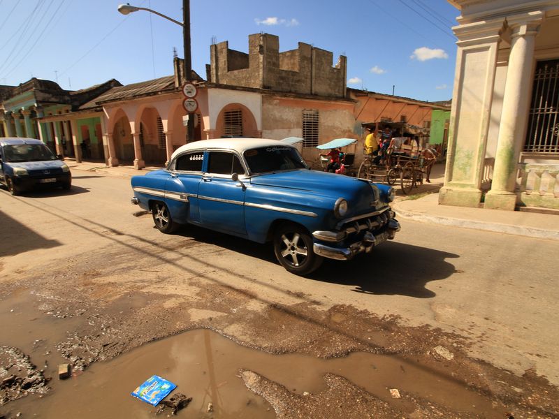 Standing at a street corner in my birth town of Güines, Cuba ...