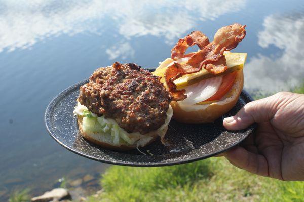 A Fully-loaded hamburger at the lake thumbnail