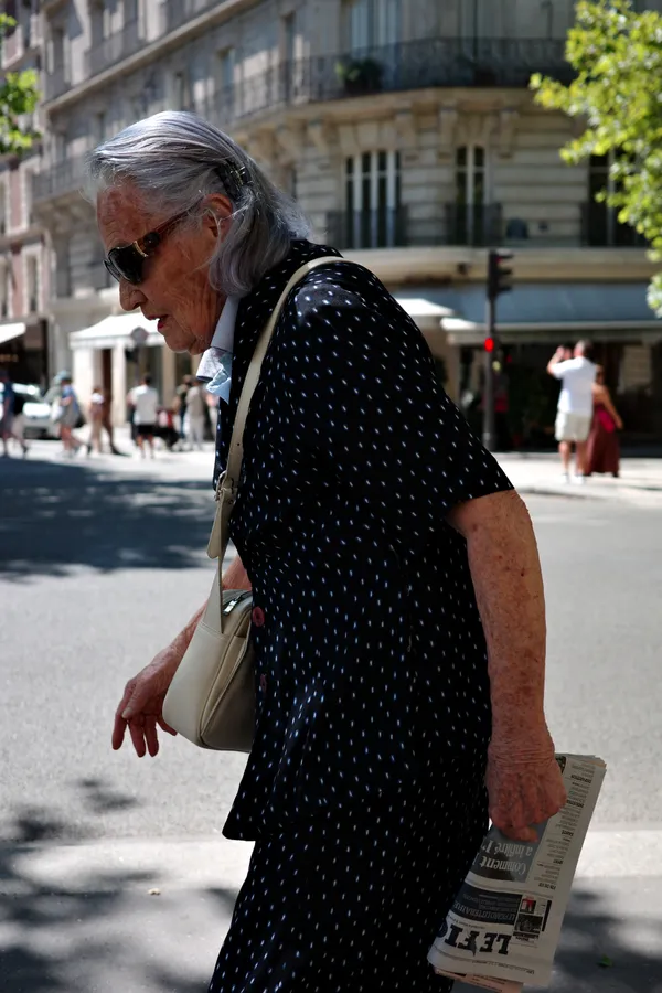 Old Woman with a Newspaper thumbnail