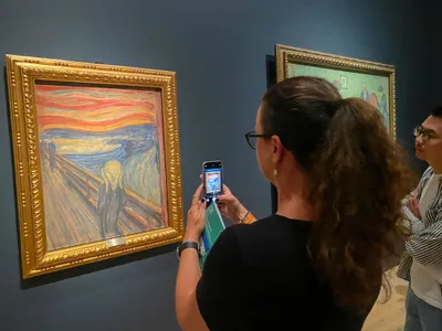 A visitor examines Edvard Munch&#39;s The Scream&nbsp;at the National Museum in Oslo, Norway.&nbsp;