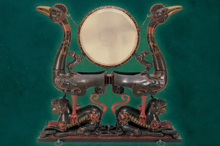 A painted drum carved with phoenixes and tigers (circa 300 B.C.E.)