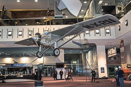For the first time in 22 years, the Spirit of St. Louis is lowered to the floor. In addition to minor preservation of the aircraft, staff are documenting all previous repairs. 
