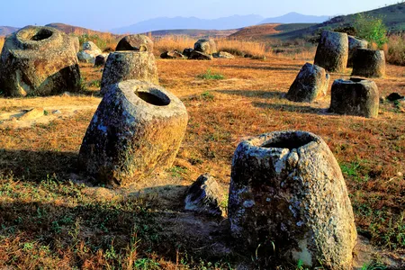 The Plain of Jars in northeast Laos may be related to burial rituals dating back 2,000 years—but the site still proves a mystery to archeologists.