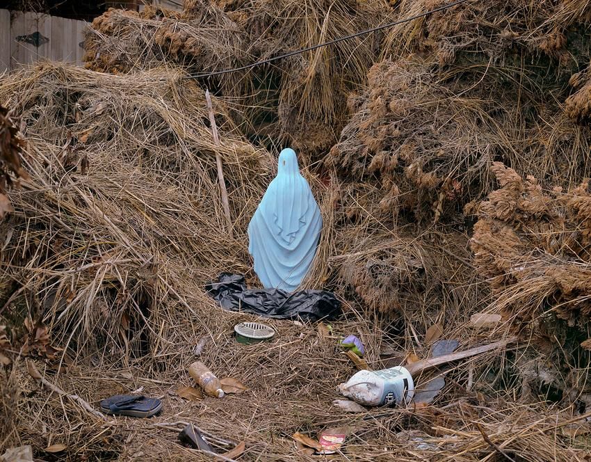 Statue in front yard, Chalmette neighborhood