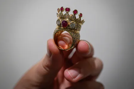 Tupac Shakur designed the gold, ruby and diamond crown ring, which recently sold at auction for a little over $1 million.