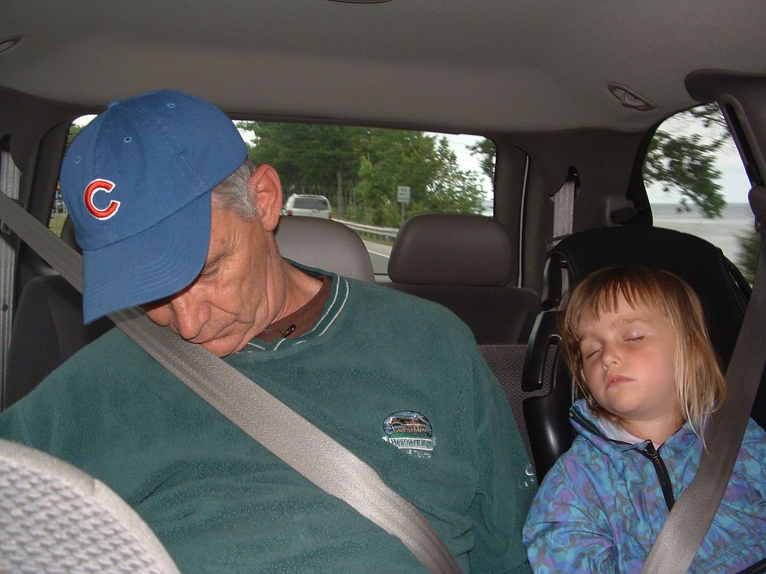Grandfather and granddaughter sleeping Smithsonian Photo  picture pic