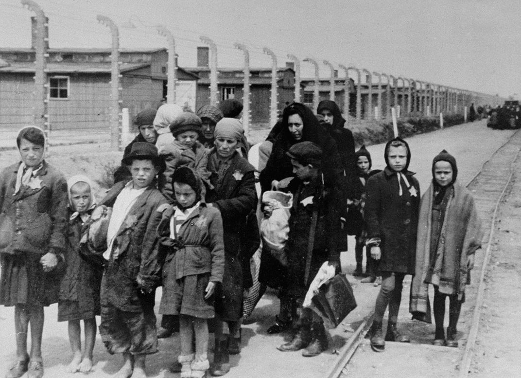 Jewish mothers and their children walking to the gas chambers at Birkenau in 1944