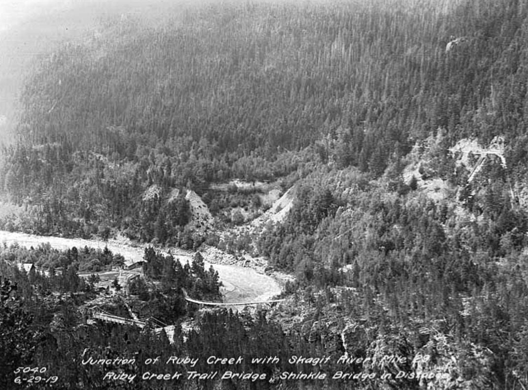 Bird's-eye view of the junction of Ruby Creek with Skagit River, near the proposed site of a dam, 1919