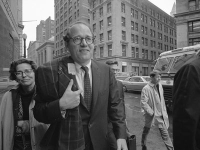 William Sloane Coffin Jr., followed by his sister, arrives at federal building in Boston on May 20, 1968.