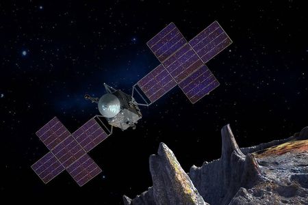 This artist's-concept illustration depicts the spacecraft of NASA's Psyche mission near the mission's target, the metal asteroid Psyche. 