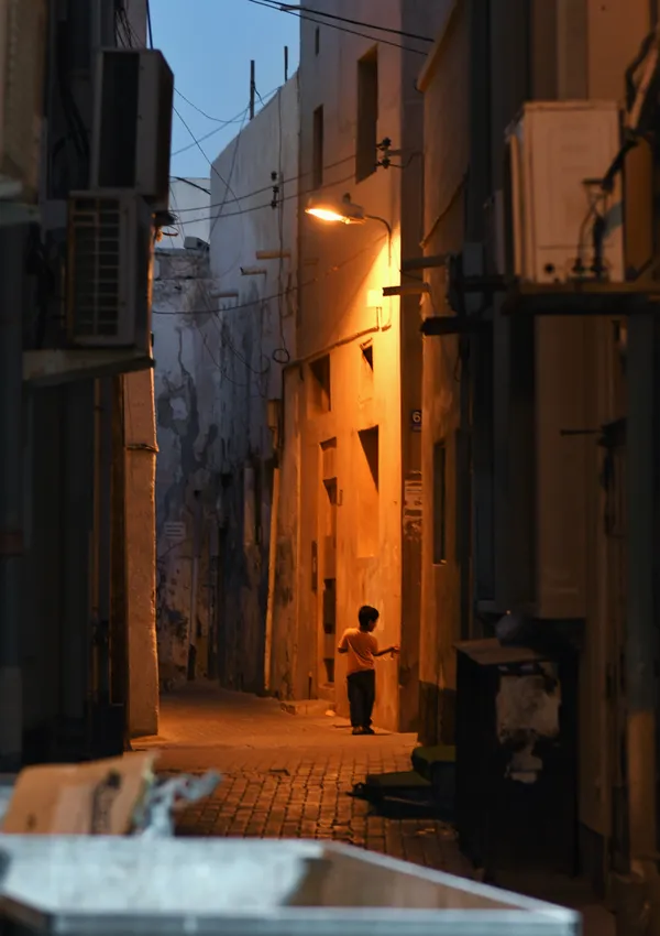 Lost in his own world, the boy explores the hidden corners of Muharraq thumbnail
