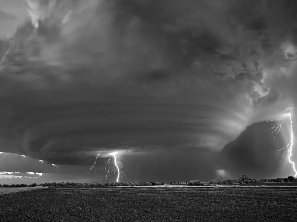 OPENER - Lightning strikes in Peckham, Oklahoma.