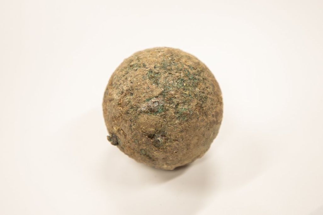 A cannonball against a white backdrop