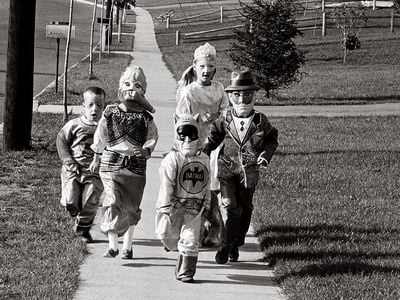 A few costumed tykes—including a Batman and a Green Hornet—hitting the streets in Oakland, New Jersey, in
October 1966. 