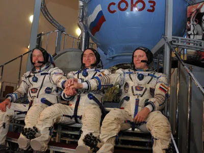 Tested friendship: NASA astronaut Steve Swanson (left), Soyuz Commander Alexander Skvortsov and cosmonaut Oleg Artemyev are preparing for a March 26 launch to the space station.